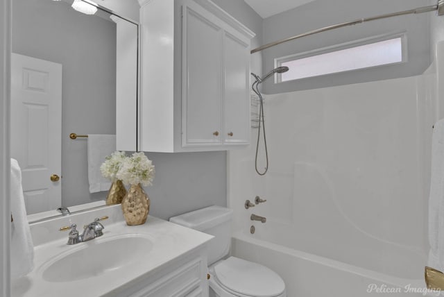 full bathroom with shower / bathing tub combination, toilet, and vanity