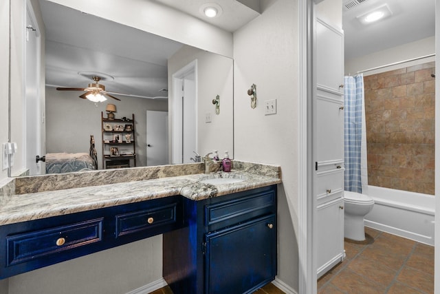 ensuite bathroom with a ceiling fan, toilet, ensuite bathroom, shower / bath combo with shower curtain, and vanity