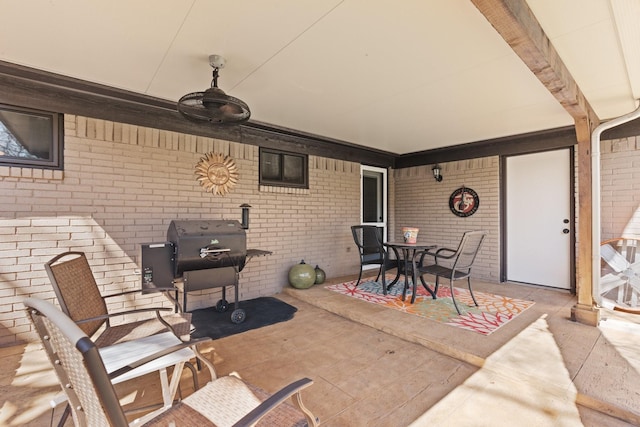 view of patio featuring a grill