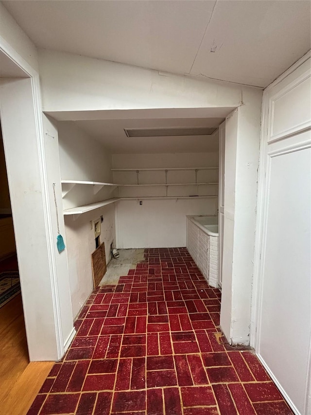 interior space with brick floor