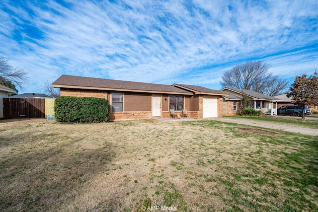 ranch-style home featuring a garage, brick siding, fence, driveway, and a front lawn