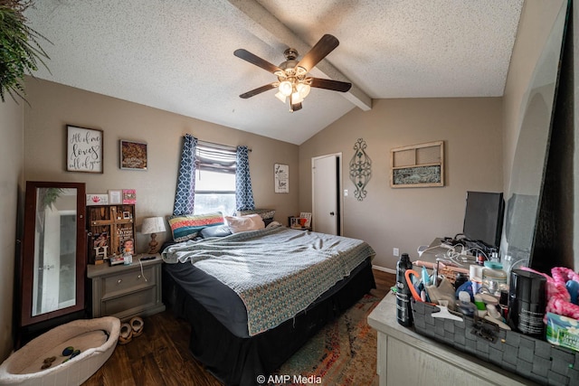 bedroom with vaulted ceiling with beams, a textured ceiling, dark wood-style flooring, a ceiling fan, and baseboards