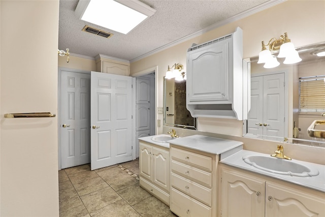 full bathroom featuring crown molding, visible vents, a sink, and double vanity