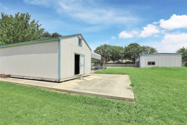 view of pole building with a yard