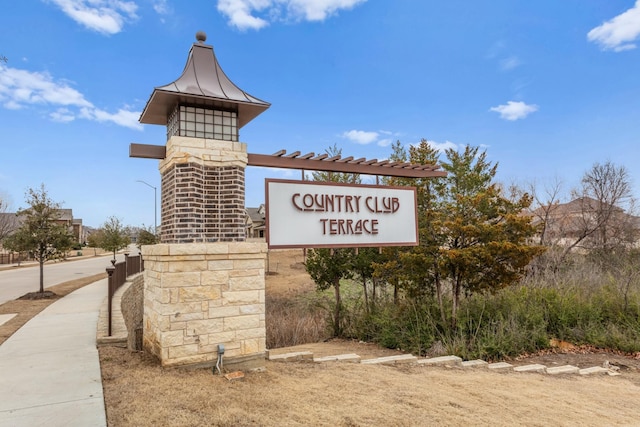 view of community sign