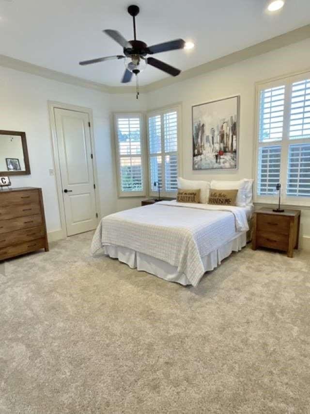 bedroom featuring a ceiling fan, baseboards, carpet flooring, and recessed lighting