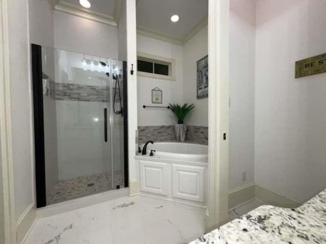 bathroom with a stall shower, baseboards, ornamental molding, marble finish floor, and a bath