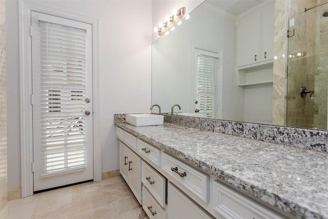 full bath featuring a stall shower and vanity