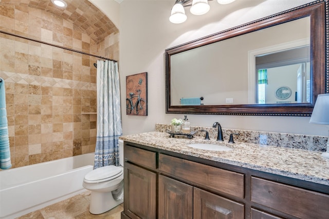 bathroom featuring toilet, tile patterned floors, shower / bathtub combination with curtain, and vanity