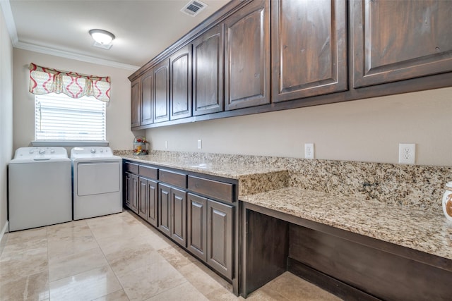 laundry area with independent washer and dryer, cabinet space, visible vents, and crown molding