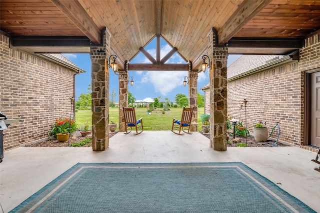 view of pool featuring a lawn and a patio