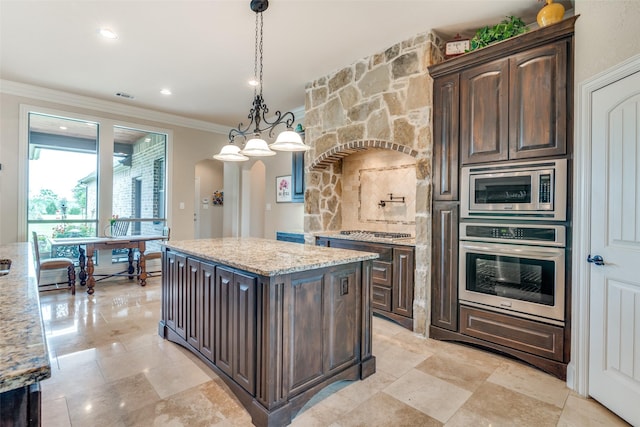 kitchen featuring dark brown cabinetry, arched walkways, appliances with stainless steel finishes, light stone countertops, and crown molding