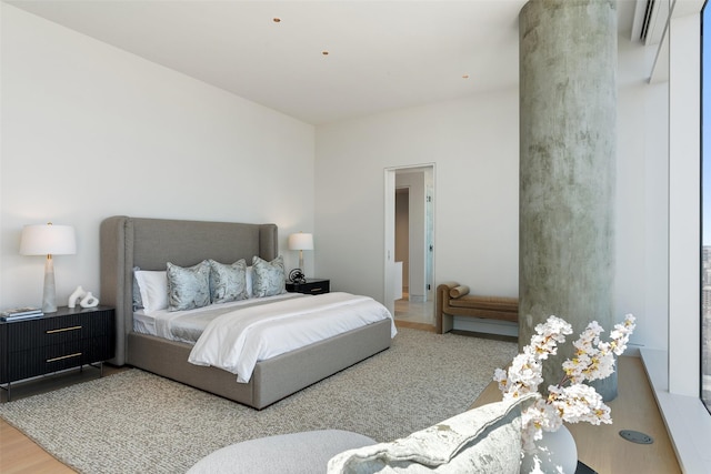 bedroom featuring wood finished floors