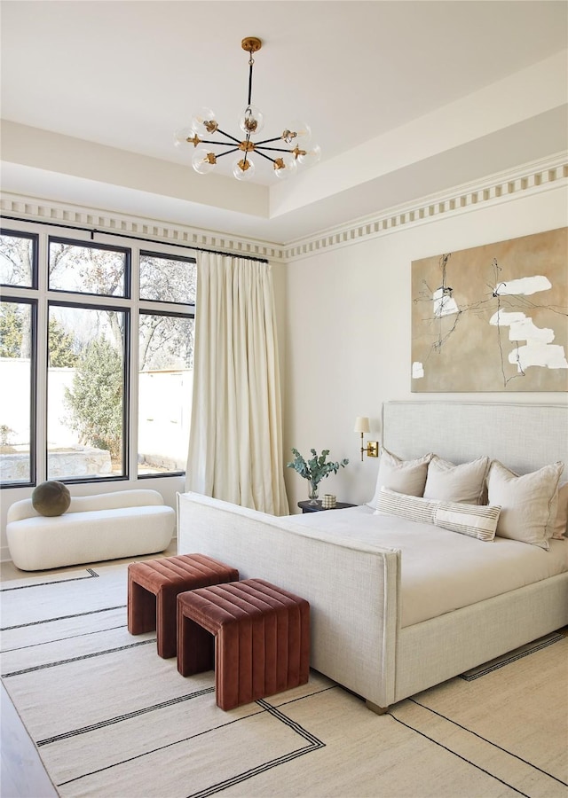 bedroom featuring a notable chandelier