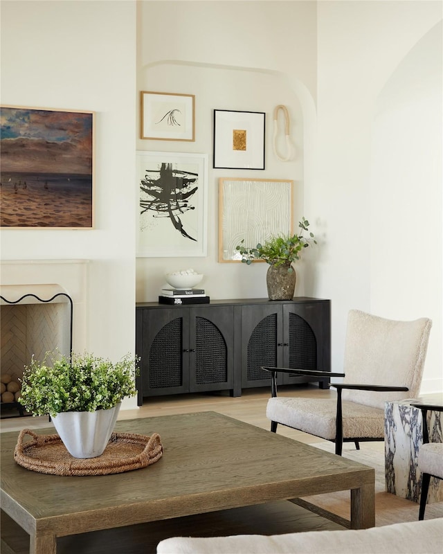 sitting room with a fireplace