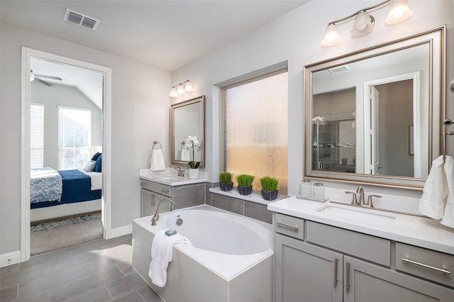 full bath with a garden tub, a sink, visible vents, and a shower stall