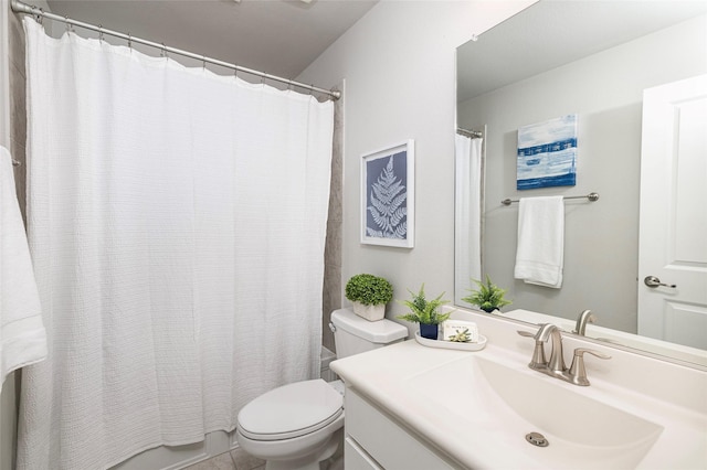 full bathroom featuring vanity and toilet