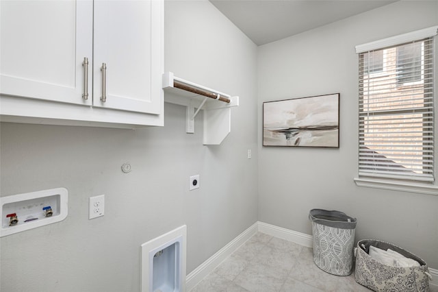 washroom with hookup for a gas dryer, hookup for an electric dryer, washer hookup, baseboards, and cabinet space