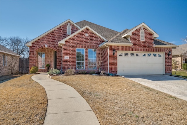 view of front of home with a shingled roof, concrete driveway, brick siding, and an attached garage