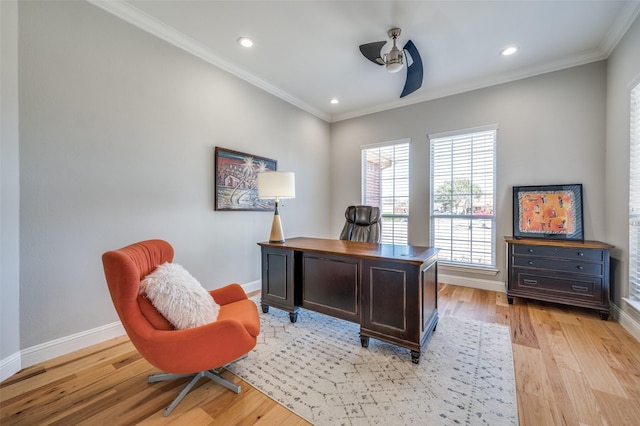 office space featuring light wood-style flooring, baseboards, crown molding, and recessed lighting