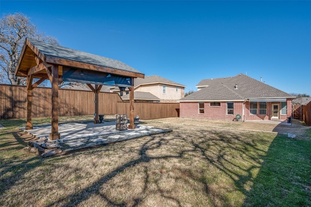 view of yard featuring a patio area and fence