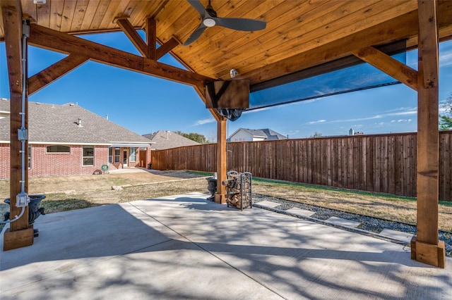 view of patio featuring ceiling fan and a fenced backyard