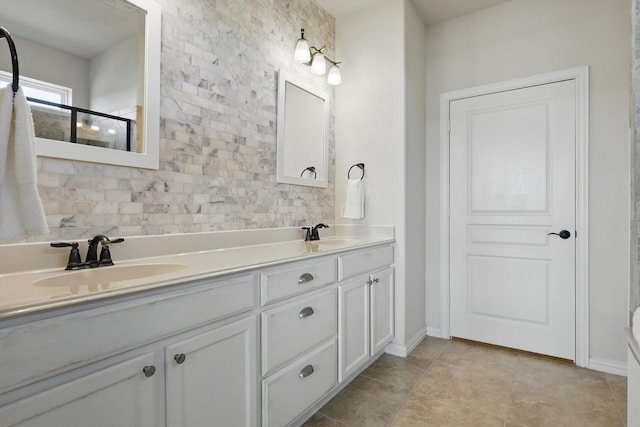 full bath with double vanity, a shower with door, a sink, and tile patterned floors