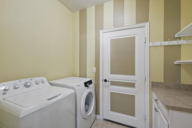 laundry area with cabinet space and washer and dryer