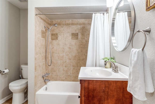 full bath featuring toilet, shower / tub combo, and vanity