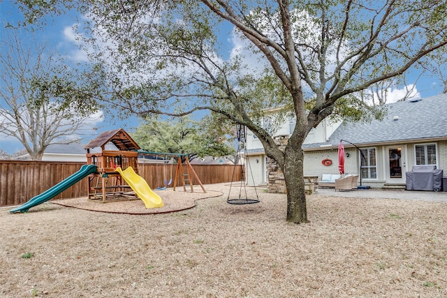 view of jungle gym with fence