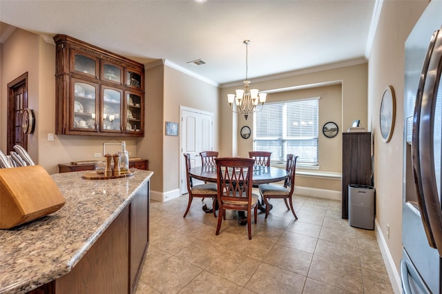2807 Millington Dr, Highland Village, TX 75077 - dining room with baseboards, ornamental molding, and a chandelier