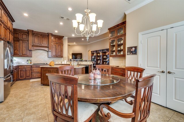 2807 Millington Dr, Highland Village, TX 75077 - dining area featuring recessed lighting, visible vents, a notable chandelier, and ornamental molding