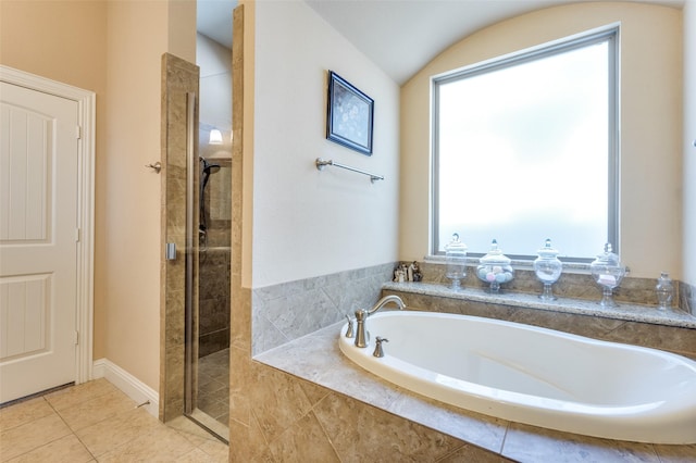 2807 Millington Dr, Highland Village, TX 75077 - bathroom featuring tiled shower, a bath, and tile patterned floors