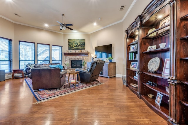 2807 Millington Dr, Highland Village, TX 75077 - living room featuring ornamental molding, visible vents, and wood finished floors