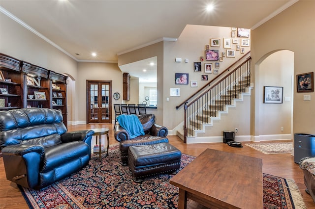 2807 Millington Dr, Highland Village, TX 75077 - living room featuring baseboards, crown molding, stairway, and wood finished floors