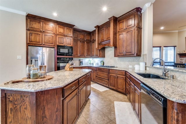2807 Millington Dr, Highland Village, TX 75077 - kitchen featuring decorative backsplash, light stone counters, ornamental molding, black appliances, and a sink