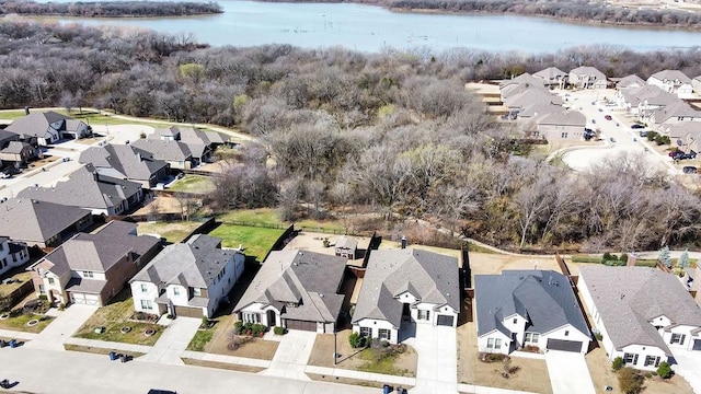 aerial view featuring a residential view and a water view