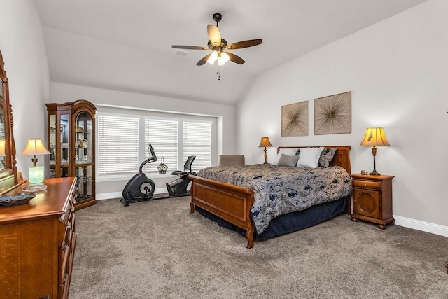 carpeted bedroom featuring lofted ceiling, visible vents, baseboards, and ceiling fan