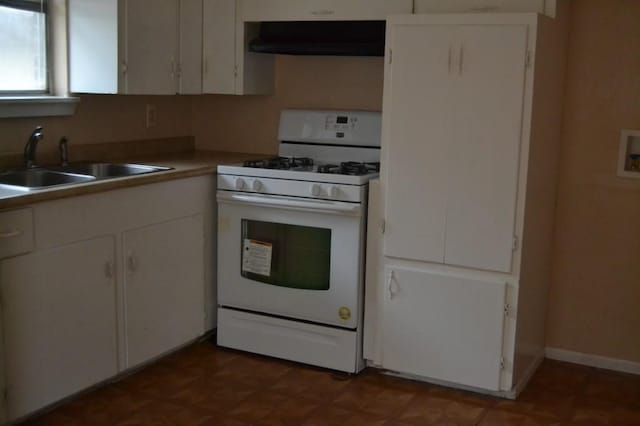 kitchen with ventilation hood, a sink, white cabinets, and white range with gas stovetop