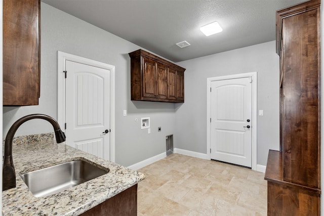 laundry room with washer hookup, cabinet space, visible vents, hookup for an electric dryer, and a sink