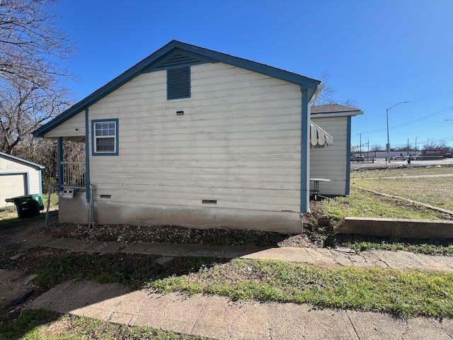 view of home's exterior featuring crawl space