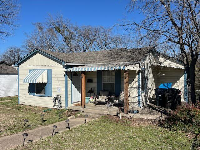 exterior space with a front yard