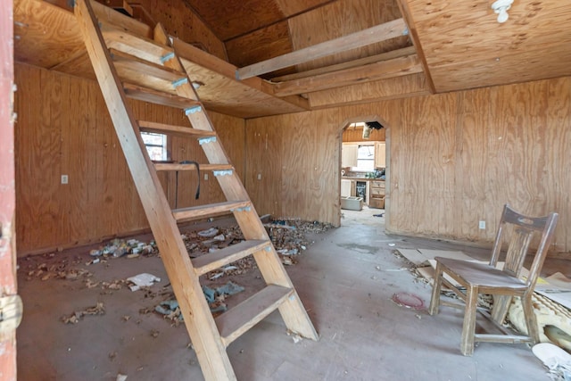 interior space featuring wooden walls