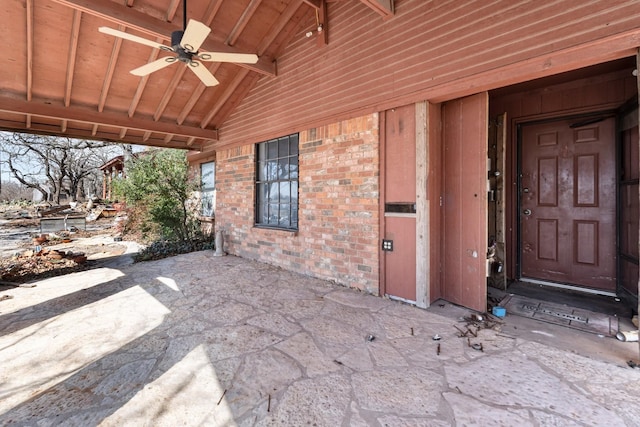 view of patio featuring ceiling fan