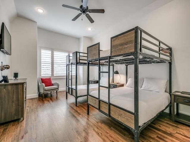 bedroom featuring recessed lighting, wood finished floors, and baseboards