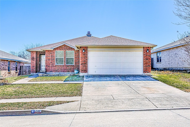 view of front of house featuring a garage, driveway, brick siding, and roof with shingles