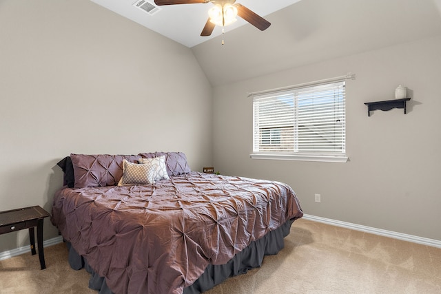 bedroom with ceiling fan, carpet flooring, visible vents, baseboards, and vaulted ceiling