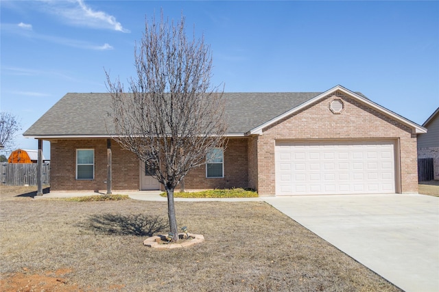 ranch-style house with brick siding, a shingled roof, concrete driveway, fence, and a garage