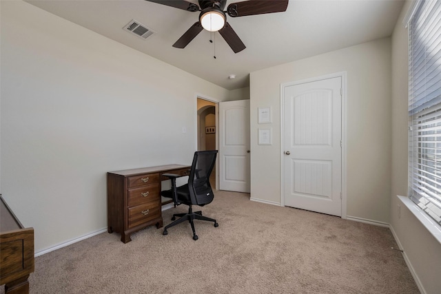 2278 Bryant Ln, Fate, TX 75189 - office space with light colored carpet, a ceiling fan, baseboards, and arched walkways