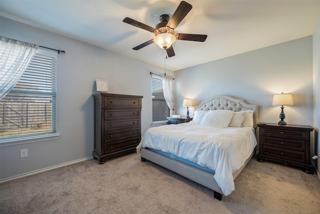 2278 Bryant Ln, Fate, TX 75189 - bedroom with light carpet, baseboards, and a ceiling fan